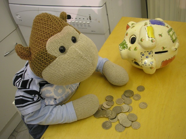 [Monkey with Piggy Bank[5].jpg]