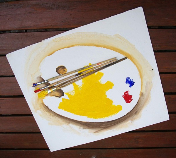 Photo of Painted Palette with Real Brushes
