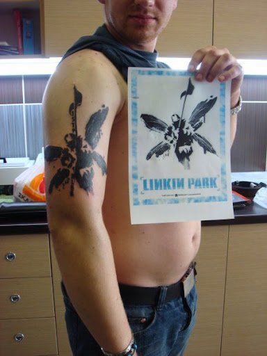 I have a Linkin Park tatoo like the one below, but on my right leg!