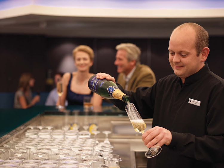 Look forward to a cocktail expertly prepared by the bartender at Seabourn's Sky Bar.