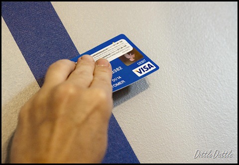 Credit Card to adhere painters tape