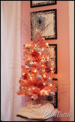 pink christmas tree with silver ornaments