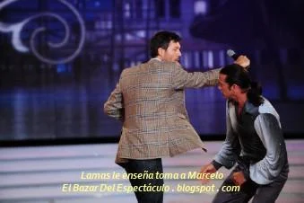 Lamas le enseña toma a Marcelo.JPG