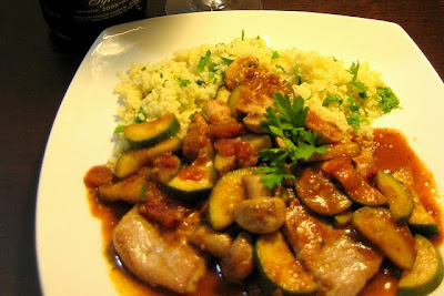 Seared Pork Cutlets with Mushroom and Zucchini in a Red Wine Tomato Pesto Sauce on Lemony Couscous - Photo by Food Tastes Yummy