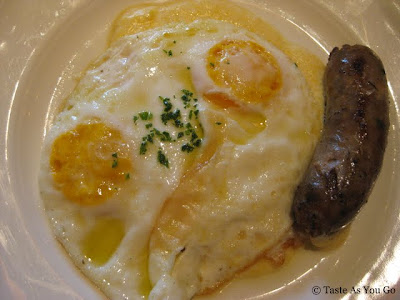 Creamy Polenta with Broccoli Rabe Sausage and Fried Egg at The Standard Grill in New York, NY - Photo by Taste As You Go
