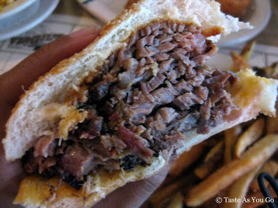 Sliced Texas Beef Brisket Sandwich at Virgil's Real Barbecue in New York, NY - Photo by Taste As You Go