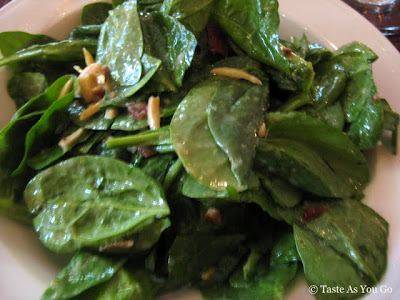 Wilted Spinach Salad with Warm Applewood-Smoked Bacon, Toasted Almonds, and Roasted Garlic Dressing at Salute in Hartford, CT - Photo by Taste As You Go