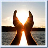hands holding the sun