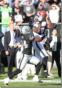 31 October 2010: Seattle Seahawks wide receiver Mike Williams (17) catches a pass over Oakland Raiders safety Michael Huff (24) as the Raiders beat the Seahawks 33-3 at the Oakland-Alameda Coliseum in Oakland, Ca ***FOR EDITORIAL USE ONLY****