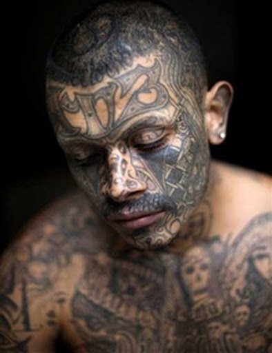 Caucasian inmate in Orange County Jail, Aryan Nation, swastika, gang tattoos