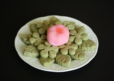 overhead of a plate of cookies with a piece of mochi on top