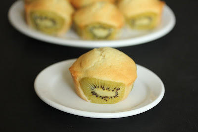 photo of one Kiwi coconut cupcake on a plate