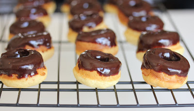 photo of mini donuts on a baking rack