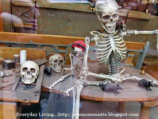 photo of a skeleton in a display window
