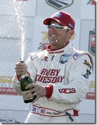 Joey Hand celebrating podium finish, 2008