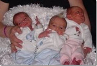 Kim and the triplets first picture together