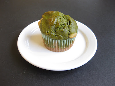 Matcha Green Tea and White Cupcake in a cupcake liner.