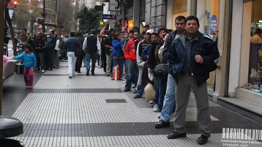 Long Line at a Bus Stop in Avenida de Mayo in Buenos Aires, Argentina