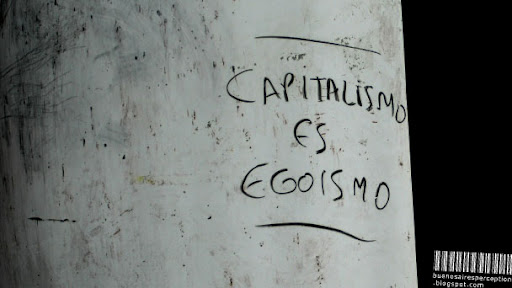 Capitalismo es Egoismo (Capitalism is Egoism) Written on an Advertising Light Box in the City Center of Buenos Aires, Argentina