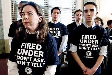Former military personnel wearing &apos;Fired under &apos;don&apos;t ask, don&apos;t tell&apos; tshirts