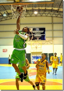 GV Leones (11) going for a lay-up.