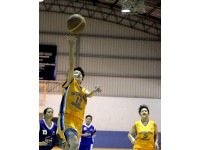Brunei-Muara's Nyu Siew Yen (L) going for a layup in their match against Tutong for the 9th National Sports Festival (PSK) last night.Picture: BT/Yee Chun Leong 