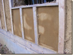 2nd coat of plaster below window