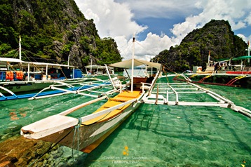 Our Boat Docked on Coron's Unbelievably Clear Waters