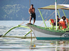 A Boat Docking at Coron's Lambingan Bridge