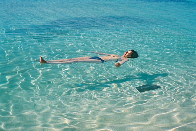[cuba-trinidad-caribbean-sea-playa-ancon-woman-floating-on-clear-water-shadow-1-my[3].jpg]