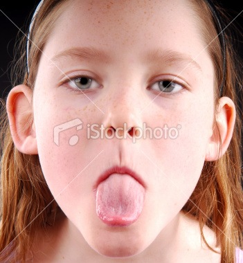 [ist2_6892983-young-girl-sticking-out-tongue[2].jpg]