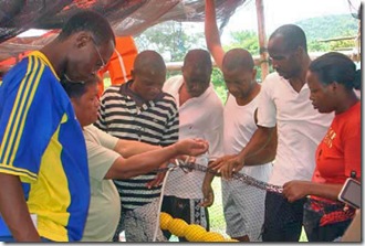 Rwandan trainees during the demonstration on assembling floaters for net cages and pens