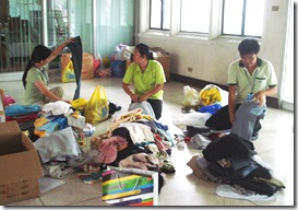 AQD employees sort out donations before turning them over to GMA Foundation
