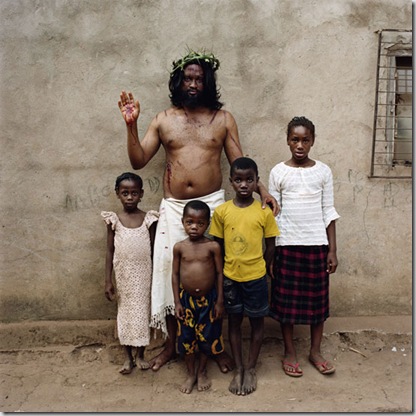 Malachy Udegbunam with children. Enugu, Nigeria, 2008