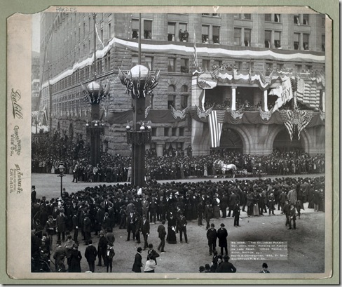 Title: The Columbian Parade. Oct. 20th, 1892. Forming of parade on lake front. 100,000 people in sight. Section No. 1
Spectators lined up along street; buildings and street lights decorated with flags.
Repository: Library of Congress Prints and Photographs Division Washington, D.C. 20540
