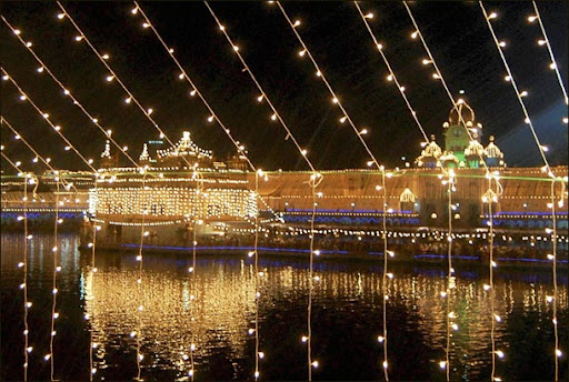 amritsar golden temple diwali. An illuminated Golden Temple