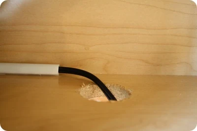 hole drilled into cabinet