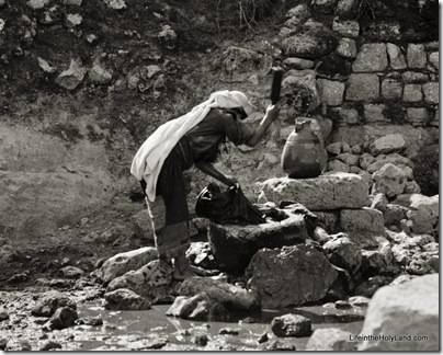 Women washing clothes at fountain, mat05312