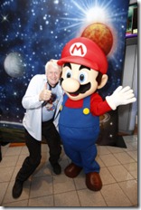 New York, N.Y. 05/21/10 - Charles Martinet, the voice of Mario, poses with the Mario character at an exclusive launch event celebrating the upcoming launch of the Super Mario Galaxy 2 game at the Nintendo World store in New York on May 21, 2010. Super Mario Galaxy 2 launches May 23, 2010.
