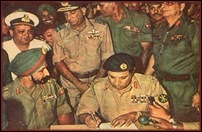 Lieutenant General A.A.K. 'Tiger' Niazi, Commander of the Pakistan Army in the East, signs the Instrument of Surrender in the presence of Lieutenant General Jagjit Singh Aurora.