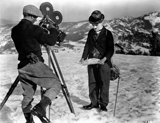 Chaplin and a cameraman during the filming of Alaska