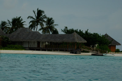 Thatched bungalow resorts line the seashore on several islands Photo by Eric Rosen