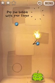 用手指把泡泡戳破，糖果就會重返地心引力的懷抱了。