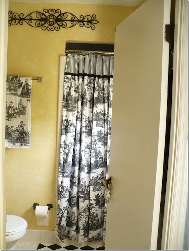 decorating a small bathroom with black and white toile