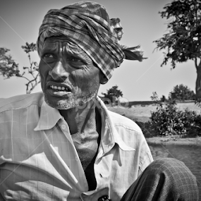 Boat man by Sagar Lahiri - People Portraits of Men