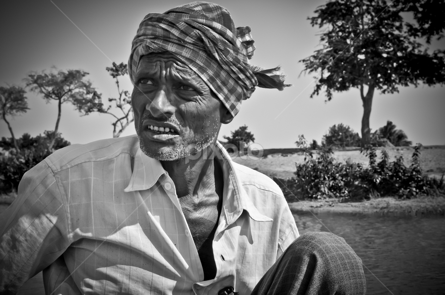 Boat man by Sagar Lahiri - People Portraits of Men