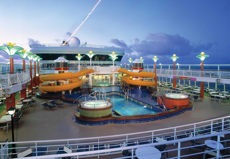Norwegian Star's Oasis Pool features slides, hot tubs and the Topsider's Bar and Grill nearby.