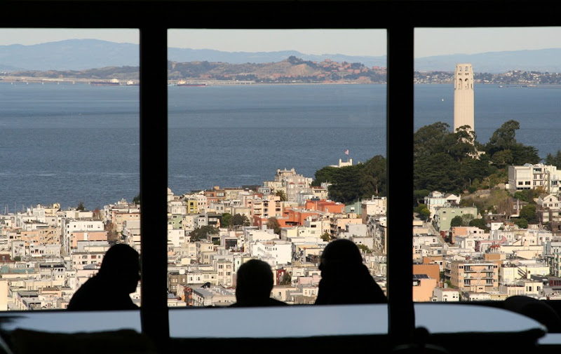 IMG_6547 Silhouettes of people eating with Coit Tower in the background