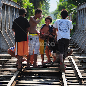Riding the skates by Cesar Cambay - Transportation Railway Tracks