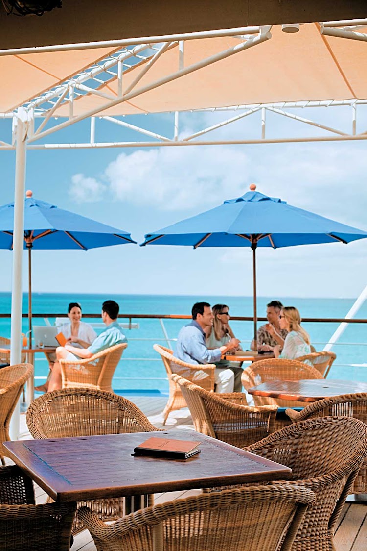 Grab a drink or bite on deck at the Compass Rose and take in the sweeping panoramas during your sailing on Windstar.